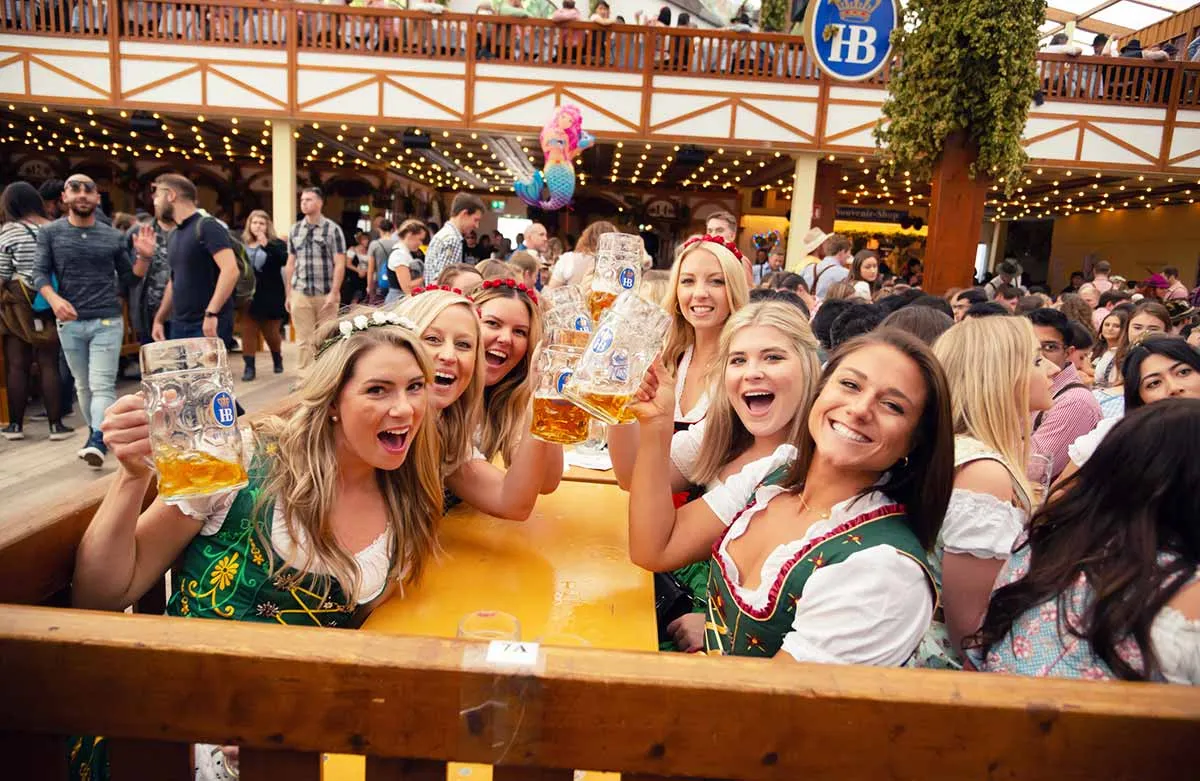 Girls drinking at oktoberfest party