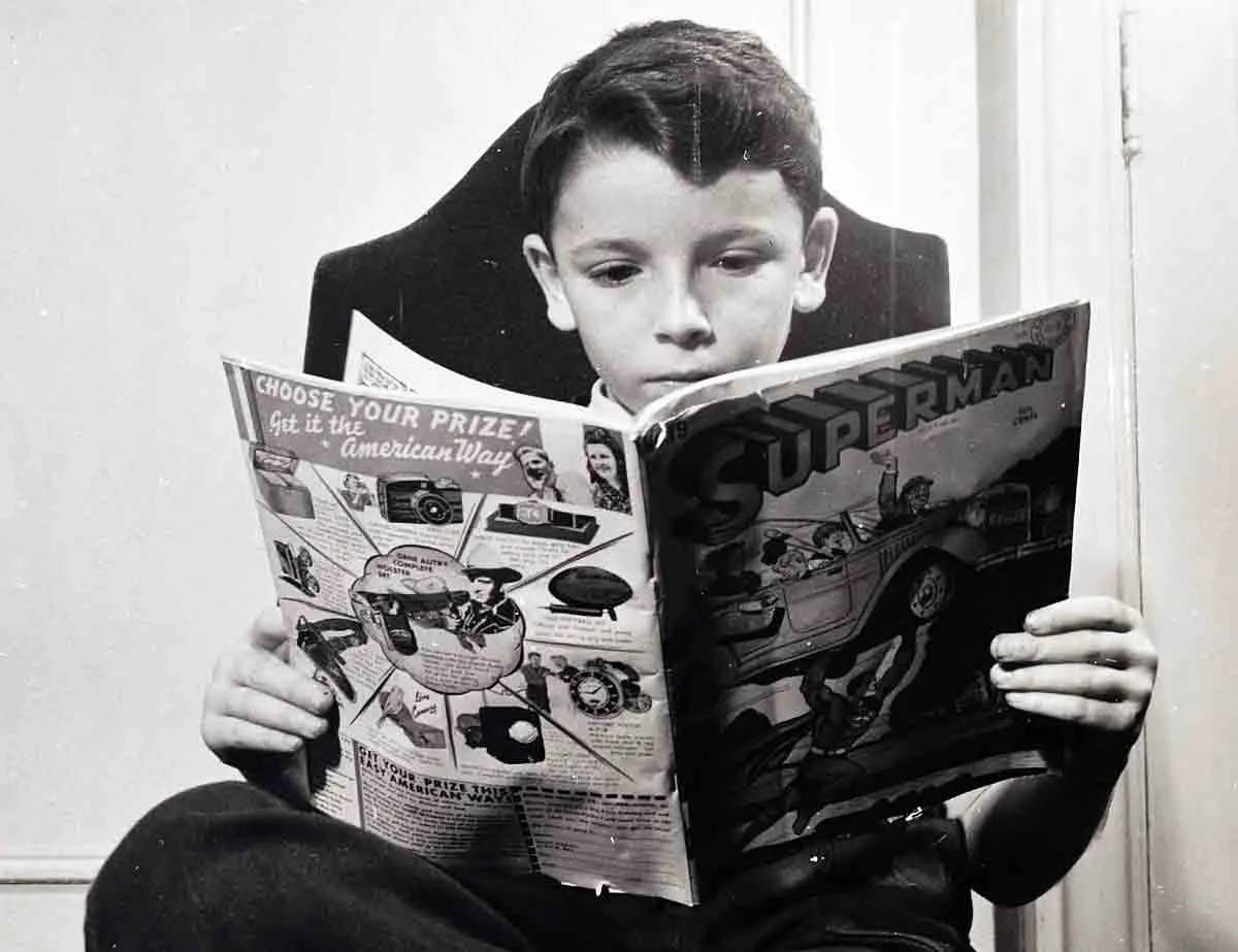 boy reading superman