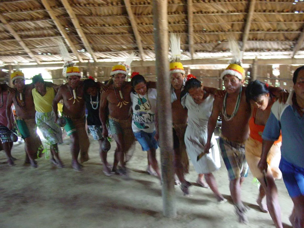 community dancing inside maloca